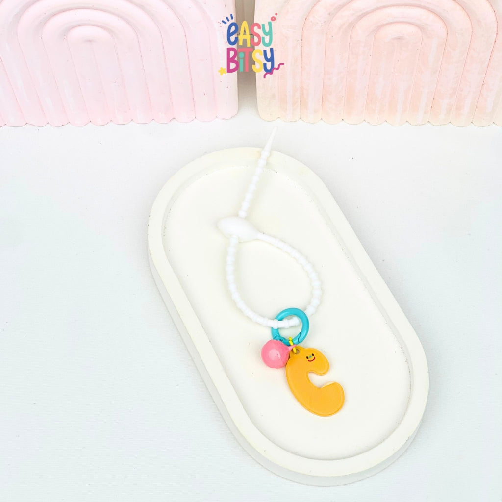 Easy Bitsy Keychain Gantungan Alphabet Akrilik Smile Polos Tidak ada merek
